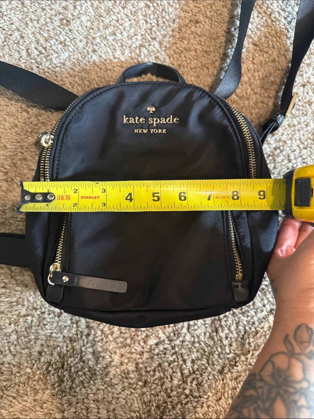 Kate Spade: black mini nylon backpack with gold hardware